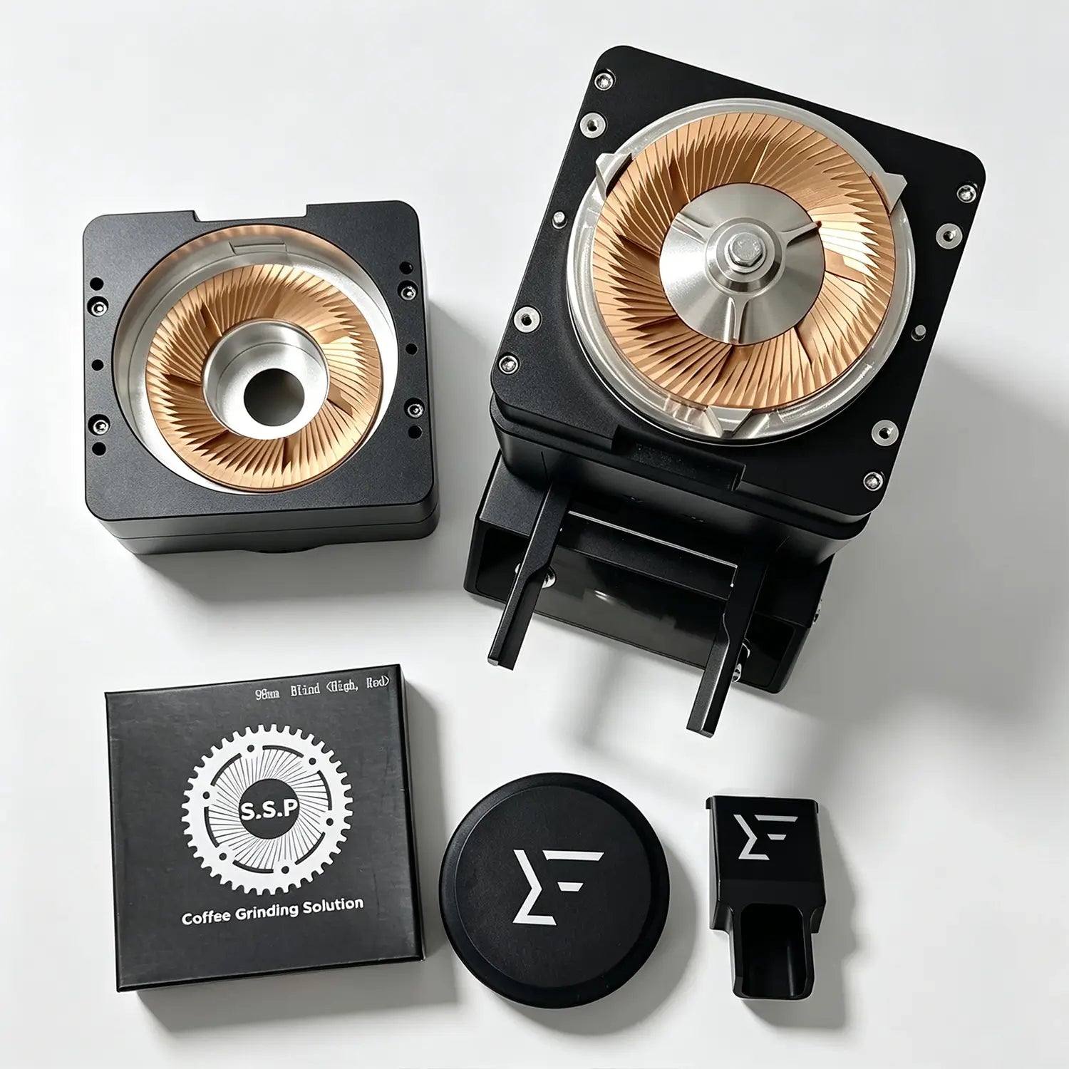 A close-up of a 98mm red copper coated flat burr mechanism inside a disassembled single dose electric grinder